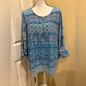 Cathy brand Ruffle Sleeve Zip neck top.